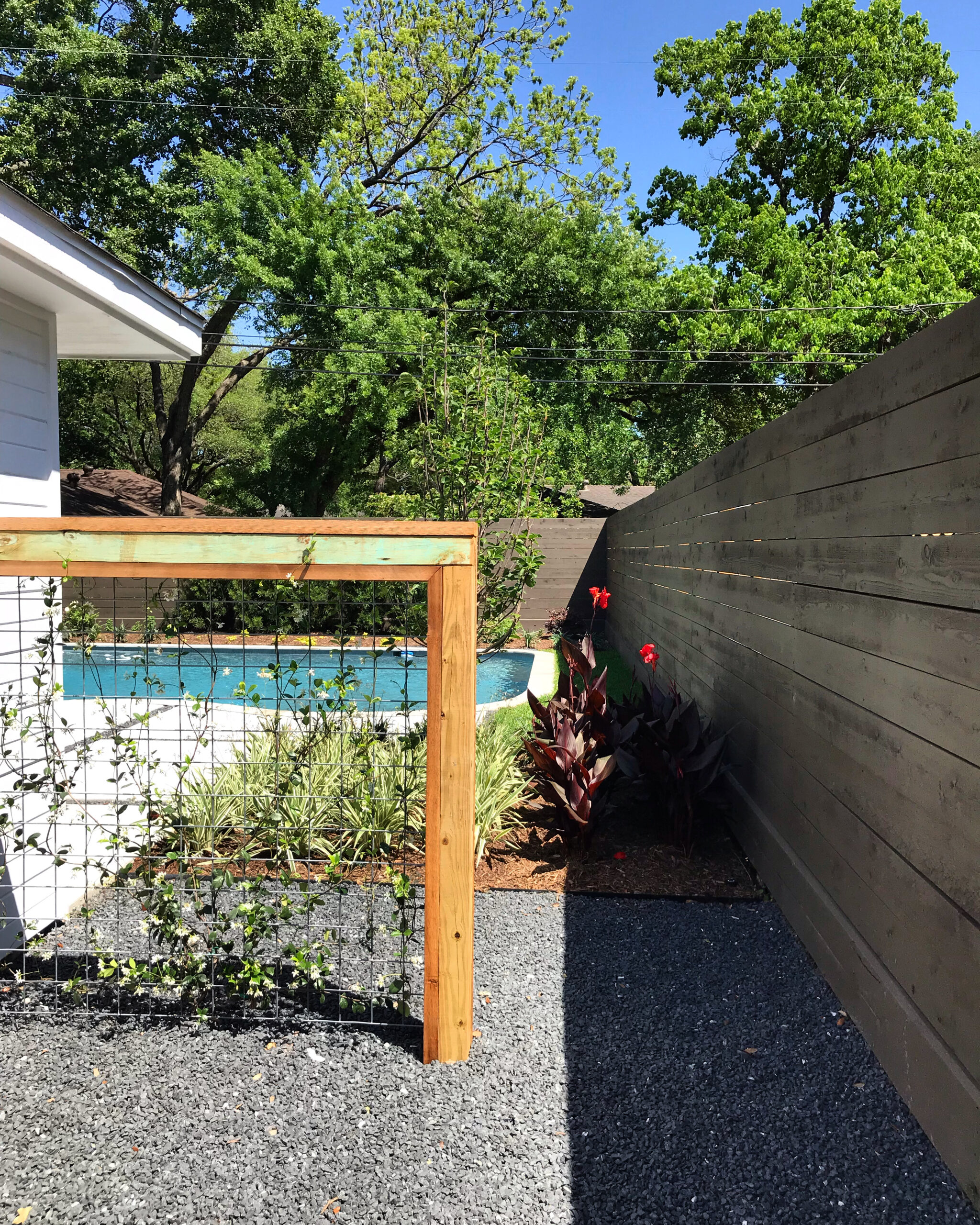 goat fence screen, goat fence panel, houston trellis, houston landscape design, houston modern landscape design, blackstar gravel,