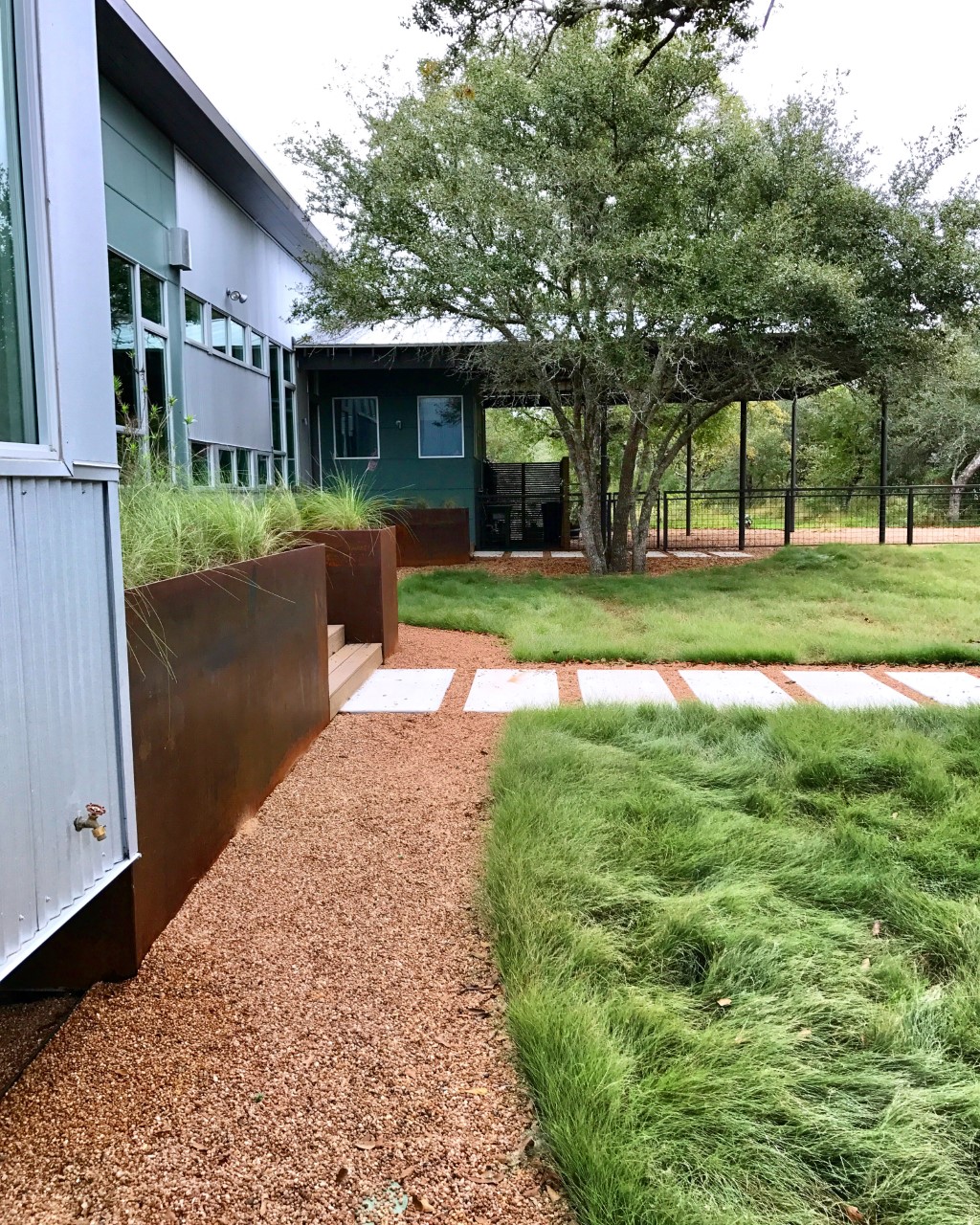 ranch landscaping, modern ranch, texas ranch, texas landscaping, arid landscaping, texas native plants, blackstar gravel, modern landscaping, rh factor, grove hill farm