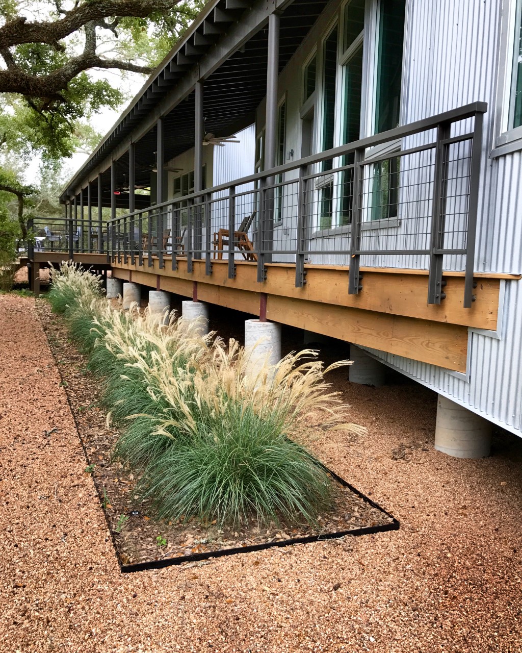 ranch landscaping, modern ranch, texas ranch, texas landscaping, arid landscaping, texas native plants, blackstar gravel, modern landscaping, rh factor, grove hill farm